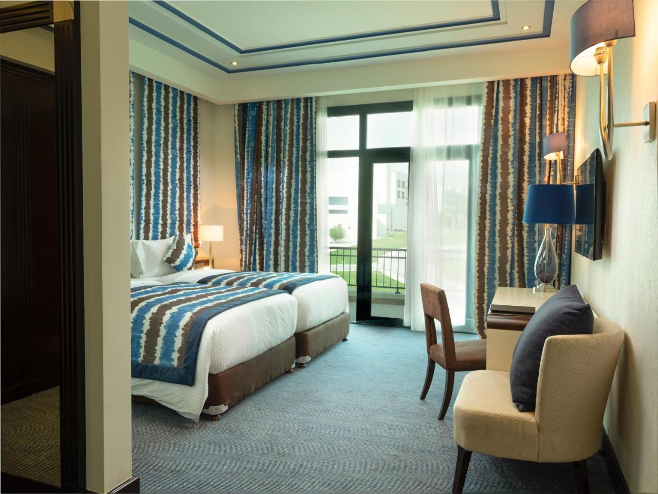 Retaj Salwa Resort & Spa Doha Buitenkant foto A room at the hotel