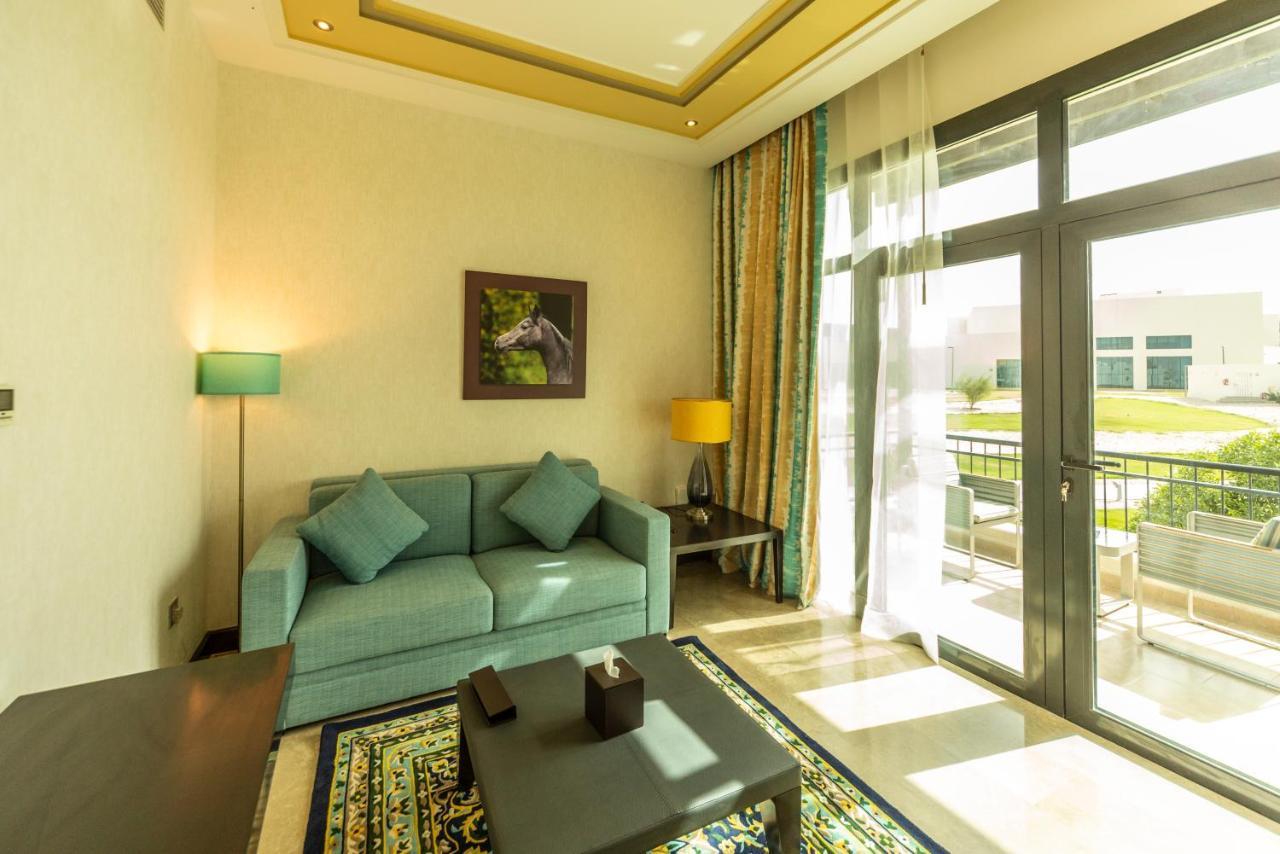 Retaj Salwa Resort & Spa Doha Buitenkant foto A living room at the resort